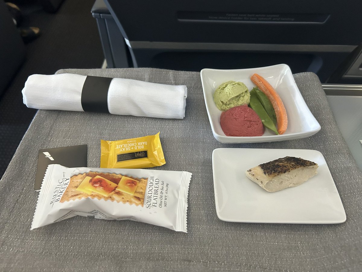 greg_soch's tweet photo. @AmericanAir I am on AA1824 in First. I pre-ordered the chicken. This is what I was served. What b*%ls”?t is this? https://t.co/FcqS0feIBG