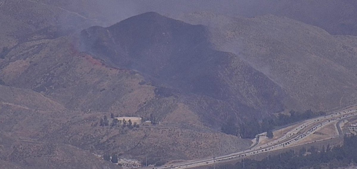 PhilDernerJr's tweet photo. The #WalkerFire climbed up and over the ridge pretty fast. Currently has S-70 “Copter 612” and OV-10 “Air Attack 310” overhead. S-2 “Tanker 73” is heading back to Hemet to get more retardant while S-64 “8HT” (in photo) is enroute. https://t.co/M8B7wXrkXR