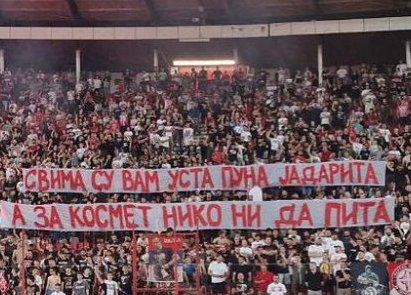 VanjaOnX's tweet photo. In the new #EU mining colony, Serbian fans displayed a banner saying, "You all have your mouths full of #Jadarit|e, and no one asks about #Kosmet." Kosmet is the #NATO-occupied part (12%) of #Serbia, #Kosovo and Metohija. https://t.co/oXq0Wll5XA