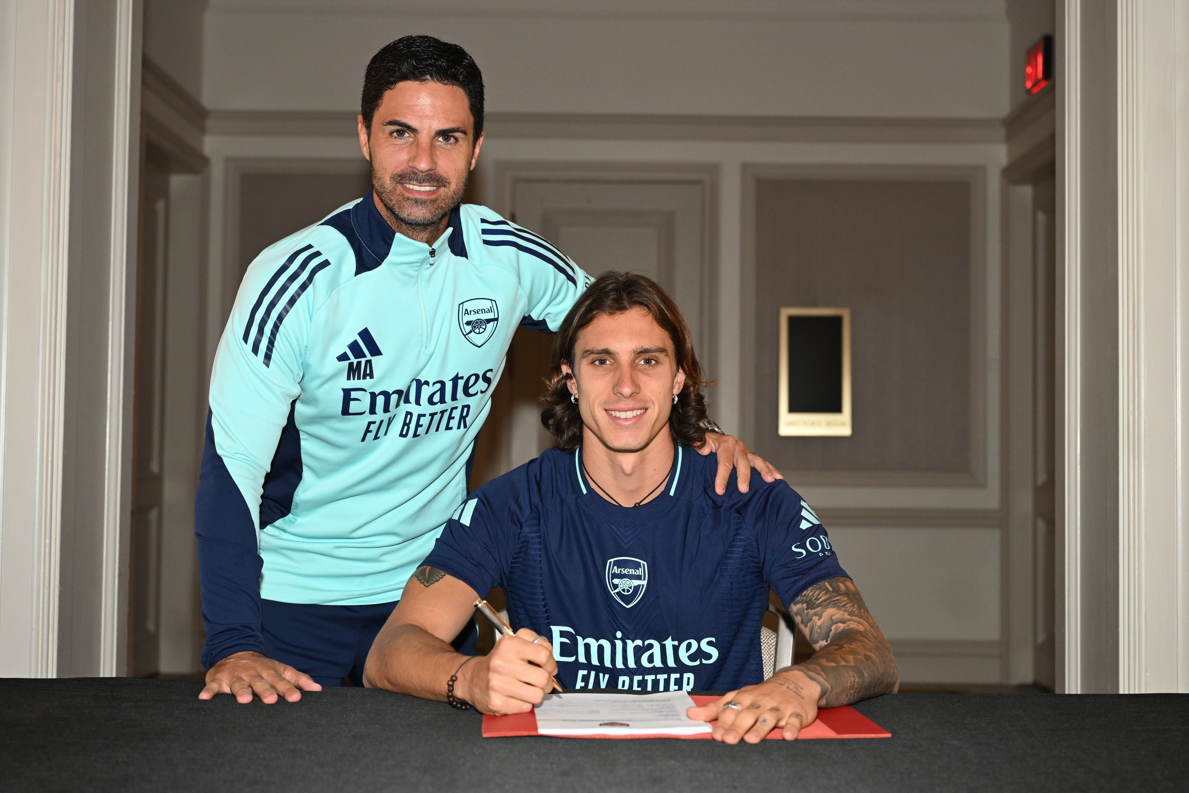 Mikel Arteta with new Arsenal signing Riccardo Calafiori 