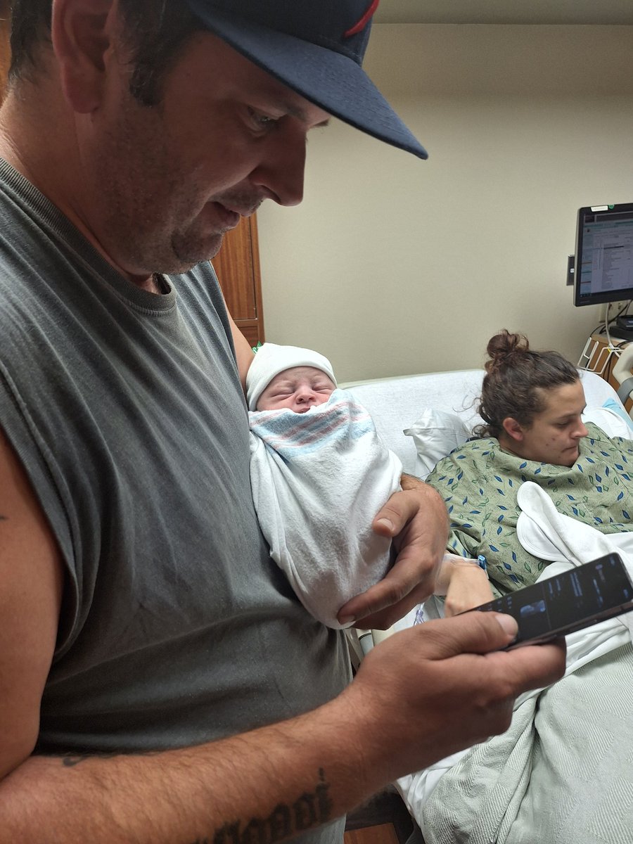 So I'm officially a great grandmother 
Meet Cody in my son,will's arms and his daughter lakoda in the bed