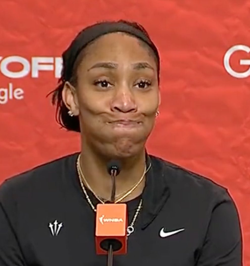A’ja Wilson holding in a laugh