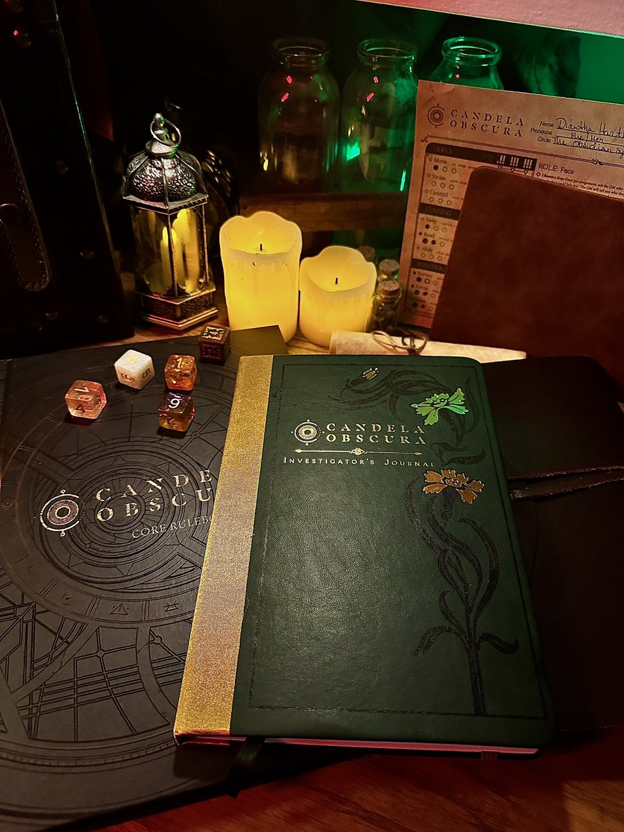 Hi, hello, yes. I will never get over how aesthetically pleasing this journal is. 

<a href="/DarringtonPress/">Darrington Press</a>’s Investigator’s Journal is way prettier in person and I’m sure I’ll be writing multiple character stories in it before it’s full! ✨

#candelaobscuraweek #candelaobscura #ttrpg