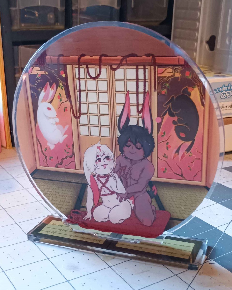 ShibariZine's tweet photo. The keychains and standees have arrived! They're looking gorgeous! Credits to @sirpolpoart for designing the keychain and part of the Standee, which is a collab between @sirpolpoart and @theartarmature . #acrylicstandee #acrylicstand #acrylickeychain #keychain #shibari #kinbaku https://t.co/rHFLixwyKc