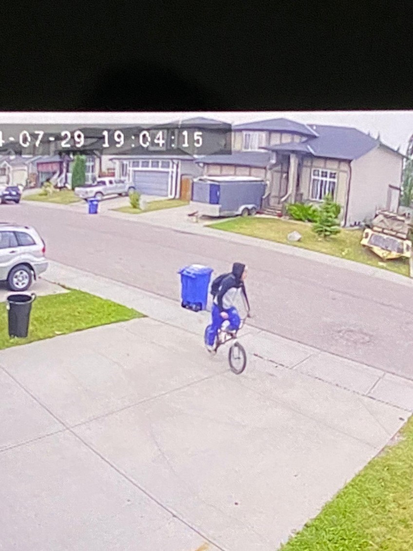 RCMPAlberta's tweet image. #CanYouHelp? #Airdrie RCMP responded to reports of gunshots fired at 2 homes in Luxstone at 7pm. We are searching for one suspect: late teens, riding BMX bike, wearing blue pants and black backpack. If you see them, Do Not Approach and phone 911 or call RCMP at 403-945-7200.