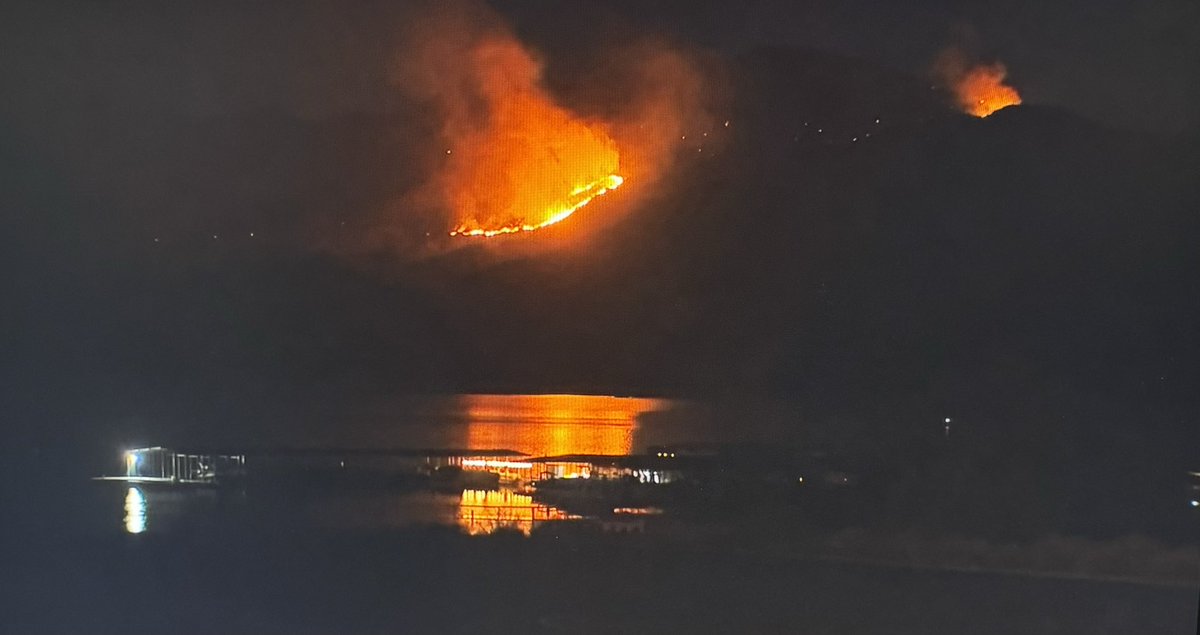 Photo from our crew covering the Sand Stone fire, reflecting in Bartlett Lake. 
-23,000 acres
-Part of SR87 closed
-Sunflower on standby to evacuate if flames get closer
