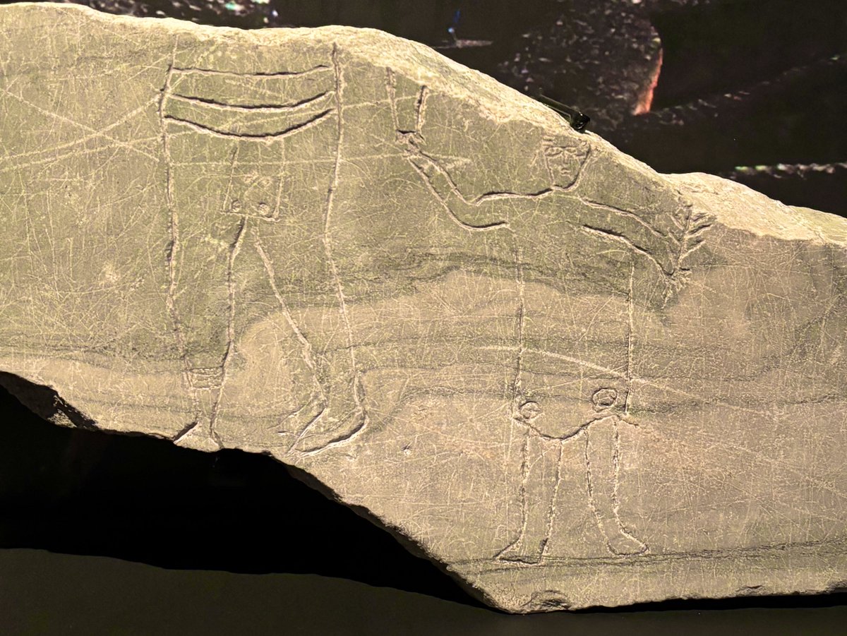 Scratched into a piece of marble from the public seating area of the Roman Colosseum, pictorial evidence for the presence of children as spectators. An adult male holds the hand of a child who is holding a palm leaf. On display at the Gladiators exhibit <a href="/mcqorg/">Musée civilisation</a> 
#RomanArchaeology