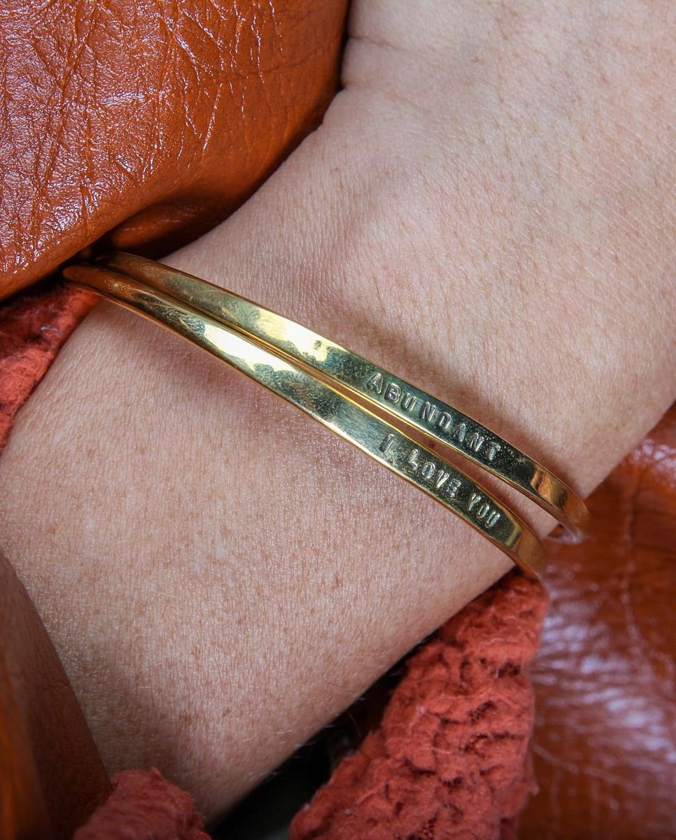 ahadibynisria's tweet photo. Stay inspired on the go with our AHADI Cuffs. 🌟

Each cuff serves a reminder of your strength and resilience. Discover your perfect mantra and shop now at https://t.co/84aX8OPhC5. 

What’s your mantra for the rest of the year? ❤️‍🔥

#ahadibynisria #brassjewelery #handmadejewelry https://t.co/iOsGJiyX1M