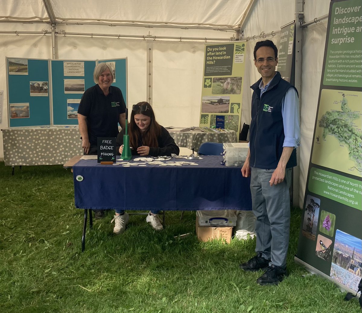 Howardian_Hills's tweet photo. It’s already busy at a gloriously sunny @RyedaleShow! Come and see us and #Ryevitaluse on our shared stand. We have badge making, competition, river table and origami https://t.co/wGThnajJfm