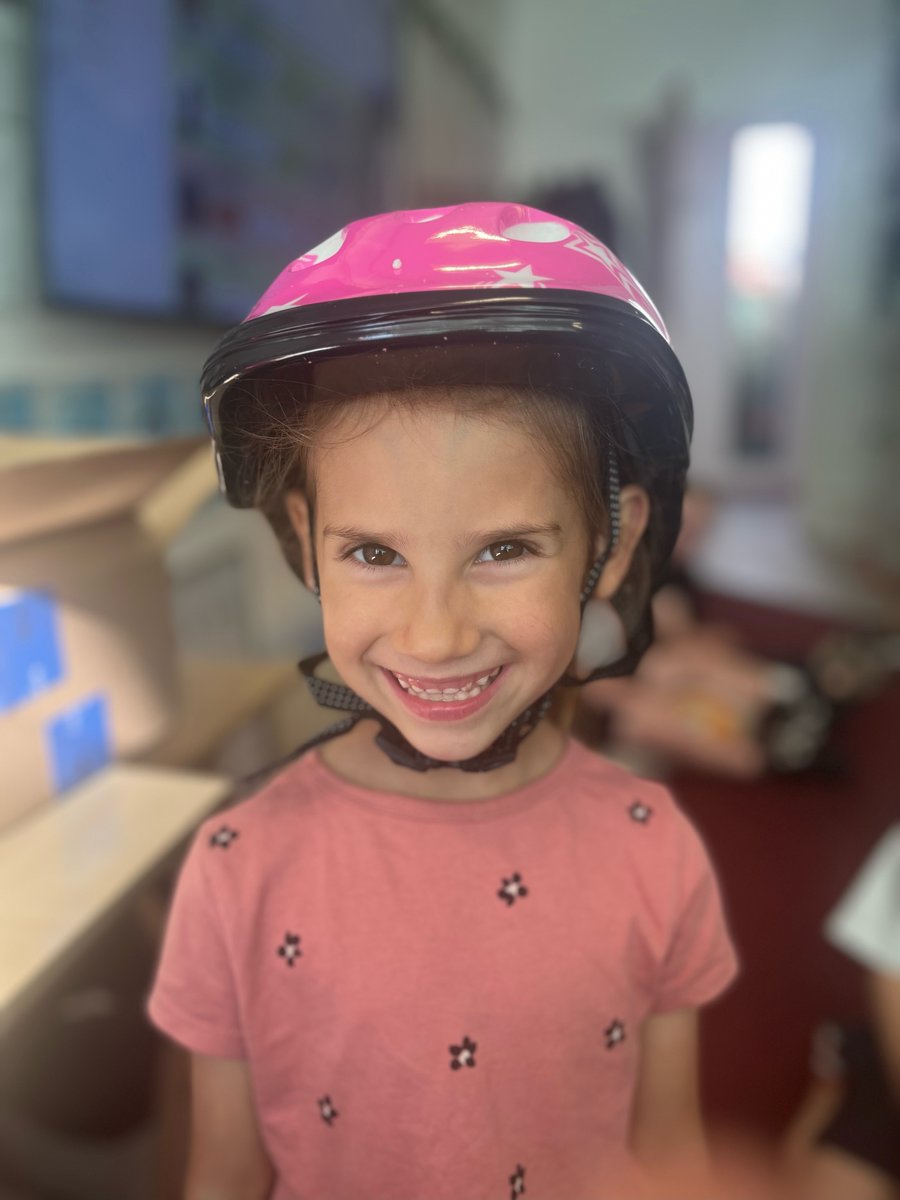 's tweet image. After we put a shout out for a used pink bike for one of our kids and got a new one sent to us anonymously, we also got sent a helmet - THANK YOU!!!!!!