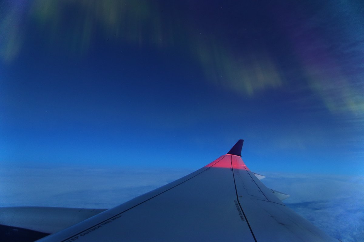 Another unedited shot of the aurora tonight, this time above some Noctilucent clouds on the right.