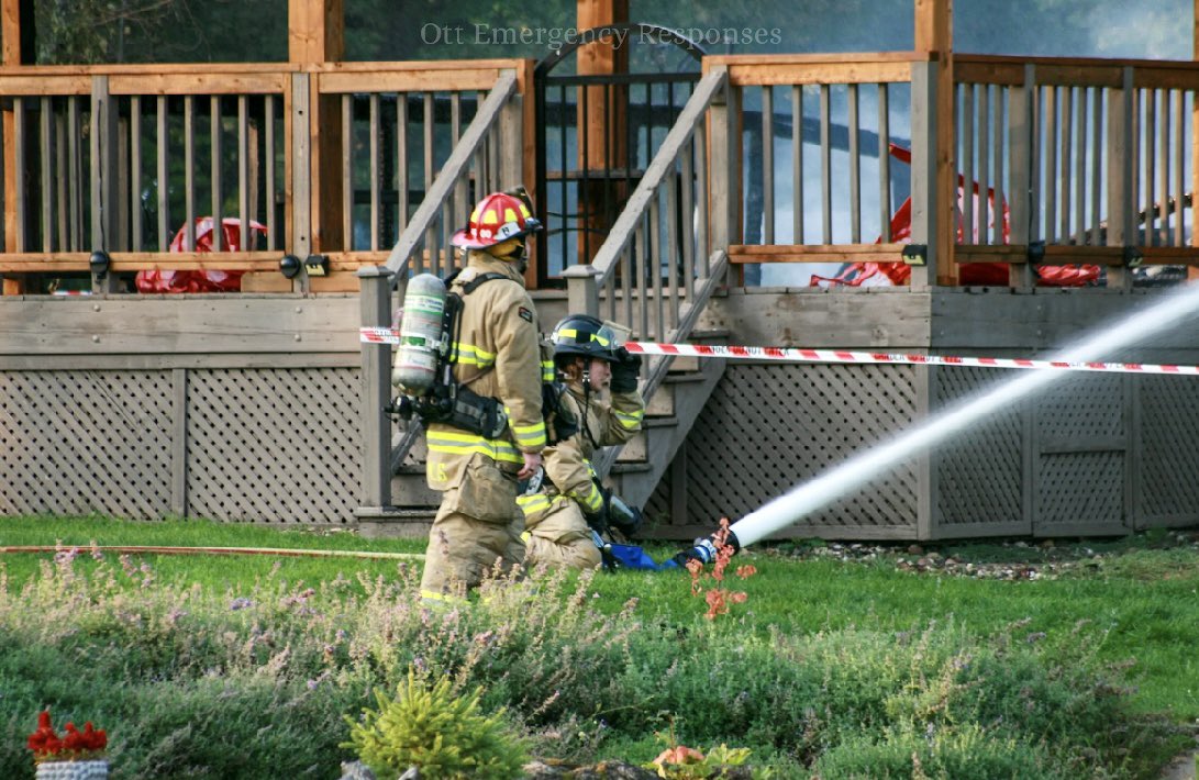OttFire's tweet photo. Firefighters battled a large structure fire in Stittsville yesterday.
 
At approx. 17:38, the Ottawa Fire Services Communications Division received a 9-1-1 call reporting a large single family home in the 0-100 block of Ridingview Cres had flames coming out of the attached garage. Upon arrival, Firefighters confirmed the flames had spread from the garage right up to the attic of the home with the flames going through the roof. Firefighters initiated a fast attack and began extinguishing the flames. It was confirmed from the home owners that all the occupants had safely exited the home. This fire was in an area of the city with no hydrants so Firefighters set up a water shuttle system using our tanker trucks to bring water in from a nearby water source. An aerial ladder was set up to attack the flames from above. Several exclusion zones were set up by our Safety Officer due to the risk for Firefighters of multiple areas of the home collapsing to the ground. Firefighters set up a defensive attack to attack the fire from the exterior due to the dangerous conditions inside the structure. The fire was declared under control at 19:35. An excavator was called to the scene to move the debris so Firefighters could extinguish hot spots. An @OttFire Investigator was dispatched to the scene along with Victim Services. We cleared the scene at 00:24 when all the hot spots were confirmed to be extinguished. #OttNews 

📸/🎥 Ethan Woolf