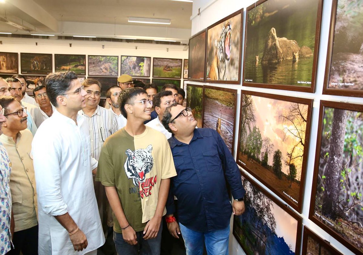 SachinPilot's tweet photo. Visited an interesting exhibition on the 'Jaipur Tiger Festival' hosted at Jawahar Kala Kendra, Jaipur. 

The display of photographs beautifully captures the magnificent beauty of tigers in their natural habitat. Kudos to the organizers for their efforts and hard work in putting this together. 
Encouraging to know that young people have shown great enthusiasm for this show 🐅 🐯 🐾 

The VR was really interesting !!😊