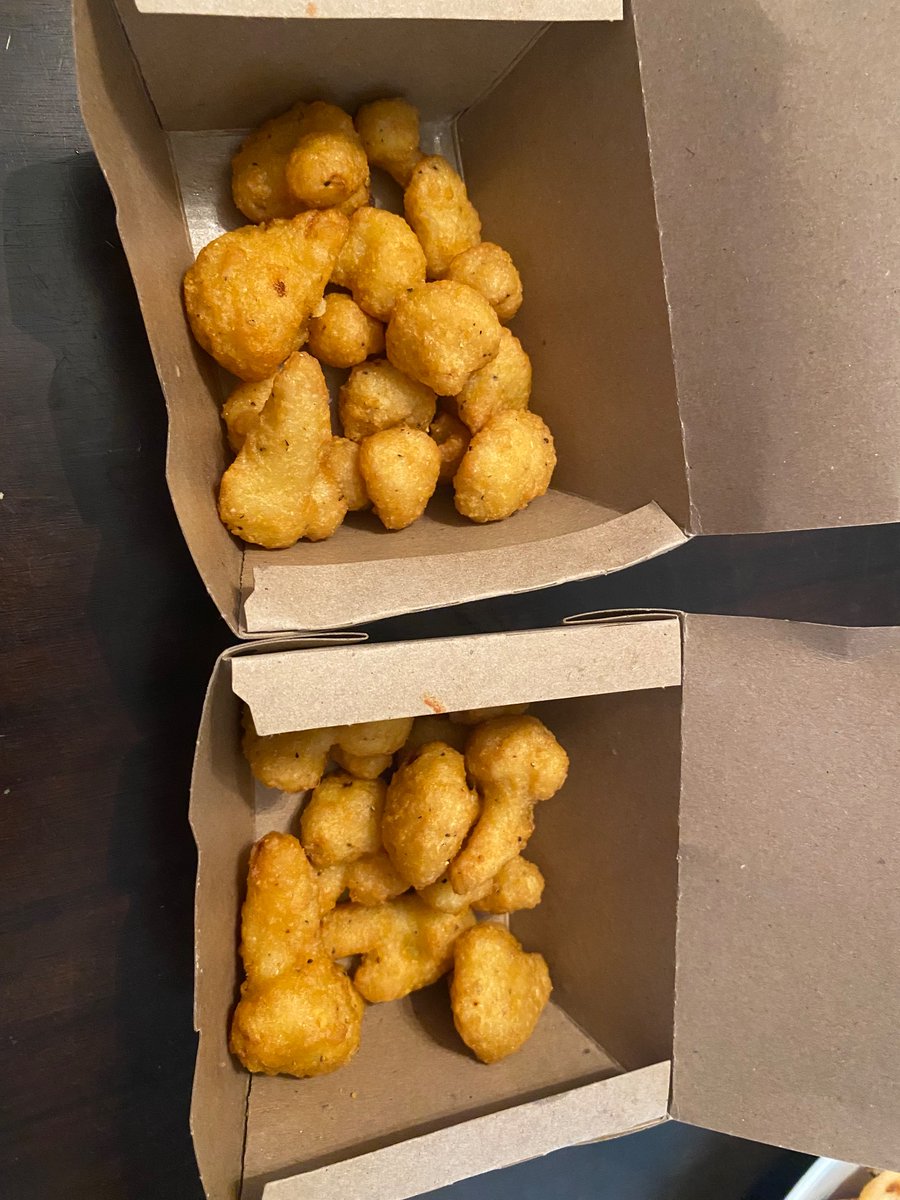 So4real6's tweet photo. @PizzaPizzaLtd very disappointed. 12.39$ for a double portion of fried cauliflower and the boxes have barely anything! Called to complain, customer service said they would send another, only to have the store call back and say it is weighed and that is the correct amount??? 👎 https://t.co/ossxrdbOqX