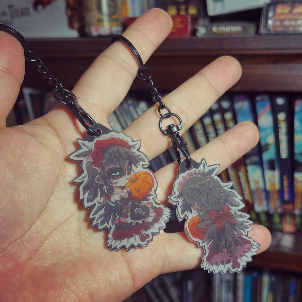 Homemade double-sided keychain 

‘Unkindness Dia De Los Muertos’