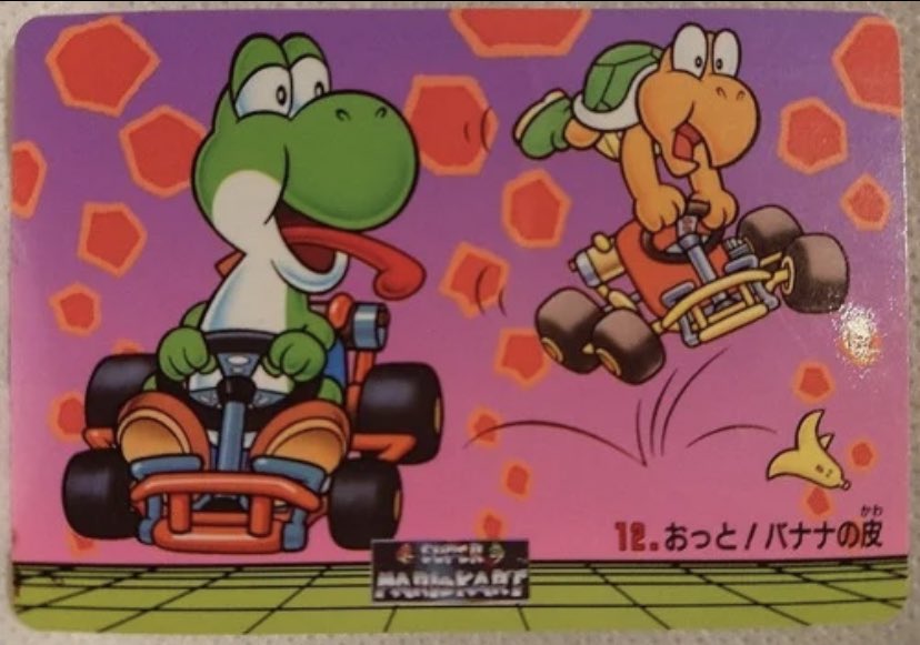 Super Mario Kart (1992) Japanese collectible card.

This card shows Yoshi racing in front of a Koopa Troopa. Yoshi appears to have thrown a sneaky banana to thwart his opponent and in turn proceeds to taunt the fellow racer. 🍌💥

#SuperMario #MarioKart #Nintendo #SNES #Gaming