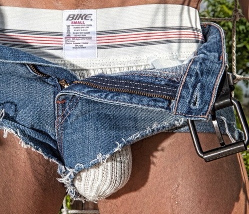 I get off wearing these ultra short cut off jeans shorts with my jock bulge full and so clearly visible to guys, making for easy access by hands or mouth!  Maybe I should put a few holes in the pouch to show some skin! 😉😈🍆💦✂️