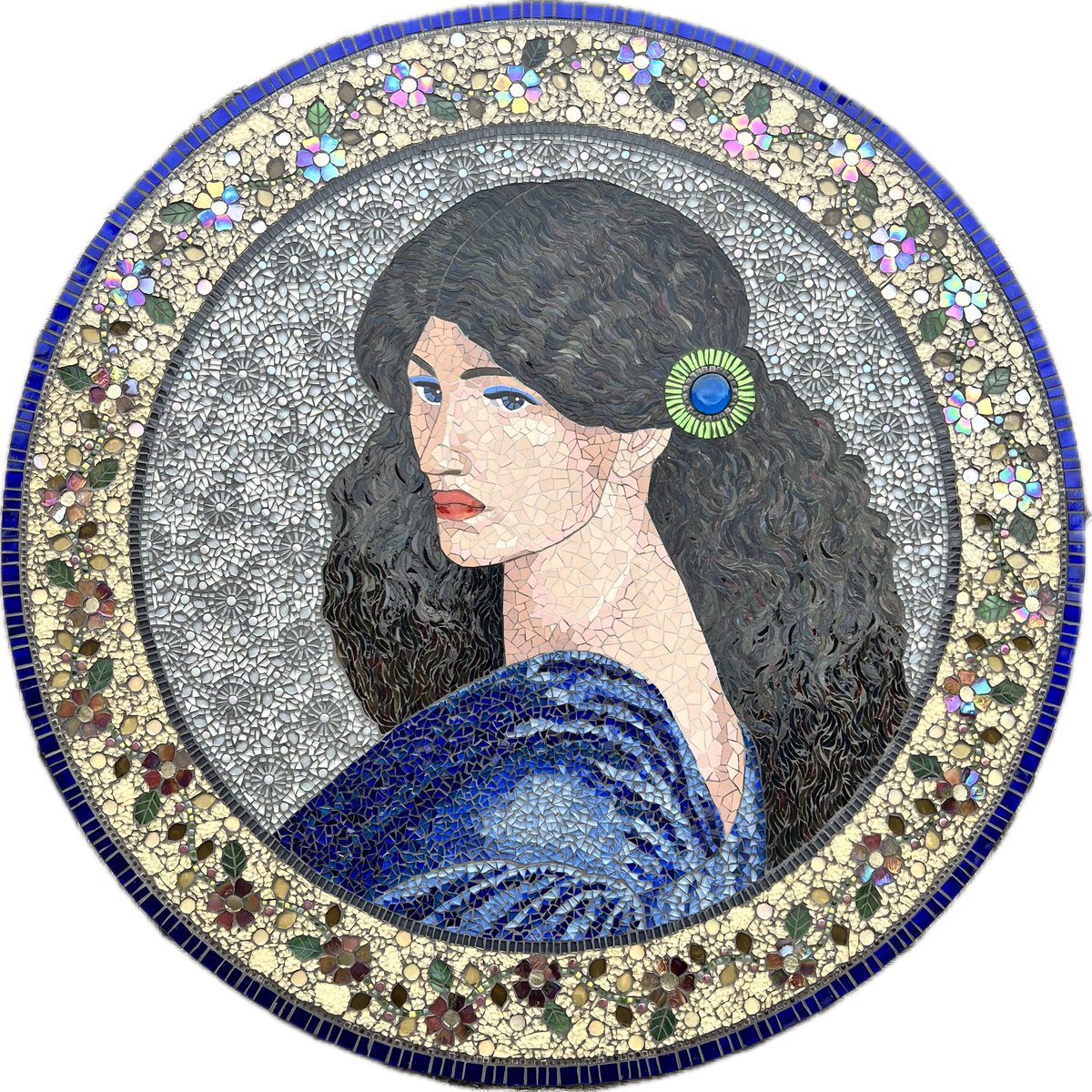 I’m so happy with my latest mosaic portrait of Jane Morris. Inspired by two Rossetti paintings but adapted. The angle of her head, her face, her hair, tweaked and changed. The background and border are influenced by her art, her era, her family and friends.
