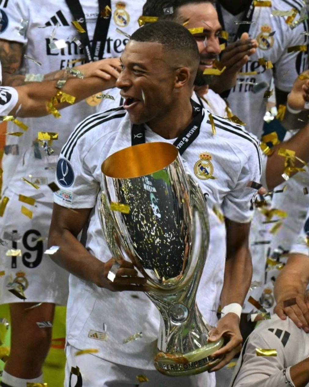YabaLeftOnline on X: "“It feels incredible to wear Real Madrid shirt”. — Kylian Mbappé says posing with his first club international trophy. https://t.co/9a7Wdt0WYh" / X