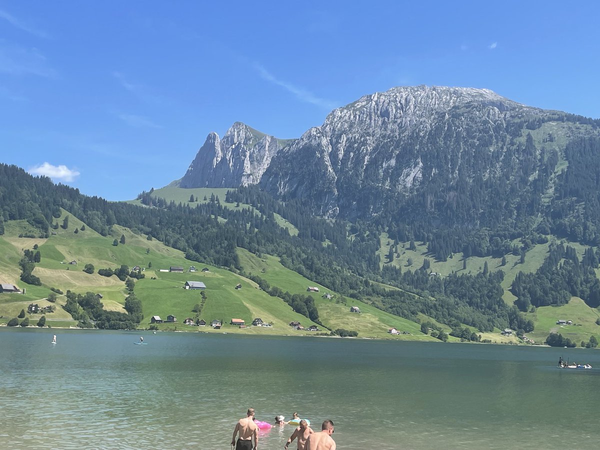 Switzerland: hikes, picnics, and beautiful lakes we swam in everyday.  Breathtaking country.