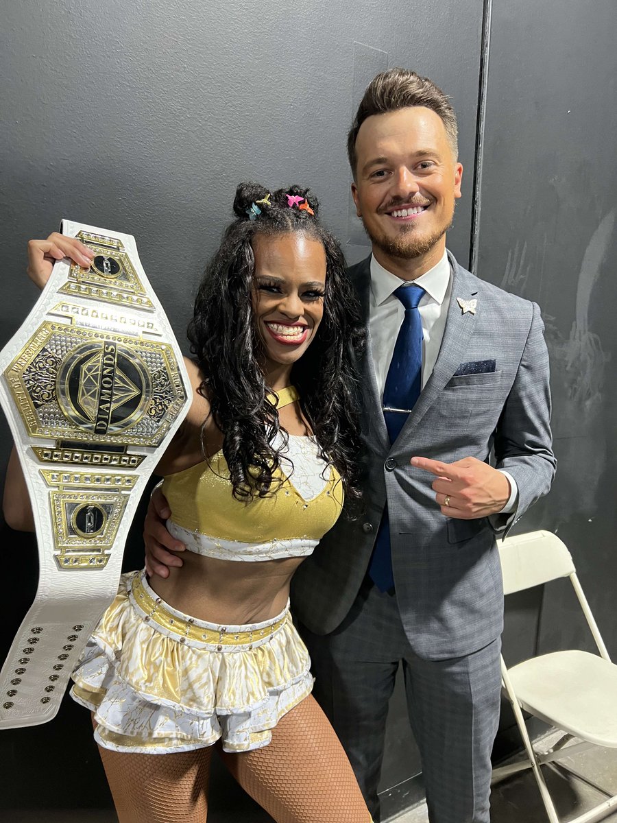 labougicana's tweet photo. 12 years in the making. #AndNew @TheOfficialROW Women’s Champion! Smooches, @BookerT5x y @bradgilmore. 💋🏆😌

#ChanelNo5 #bougiecollection #BlessedAndGrateful https://t.co/xG8lLwUNth