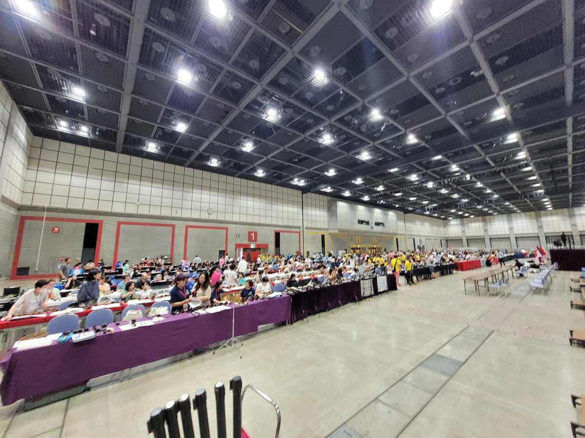 700 handbell ringers from all around the world assembling for massed ringing. Incredible sound! #handbells #ihs2024