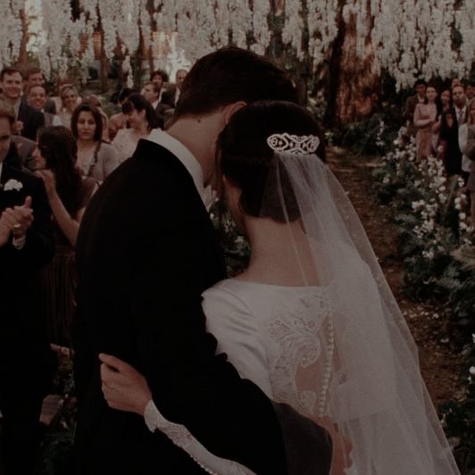 Happy 18th Wedding Anniversary, Edward and Bella Cullen. 
(August 13, 2006)