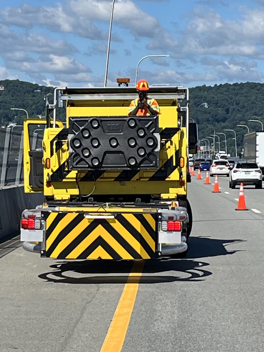 NYSThruway's tweet photo. 🚨👷👷‍♀️ #OperationHardHat: @nyspolice Troop T this morning conducted an Operation Hard Hat detail on the @GMMCB to help keep our workers safe. Don't speed in work zones, stay alert while driving and move over for roadside activity when it's safe to do so. Don't risk lives. https://t.co/L9lSyvjWxb
