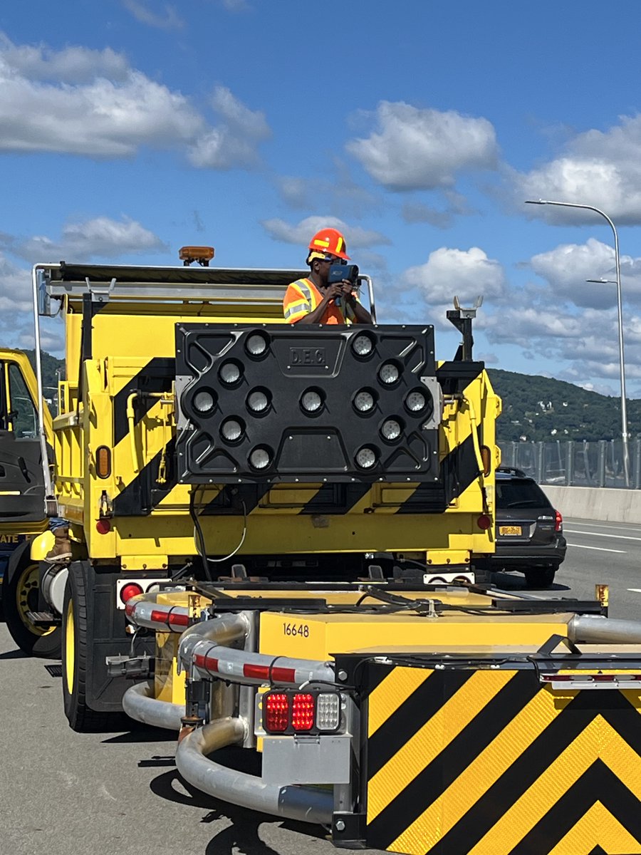 NYSThruway's tweet photo. 🚨👷👷‍♀️ #OperationHardHat: @nyspolice Troop T this morning conducted an Operation Hard Hat detail on the @GMMCB to help keep our workers safe. Don't speed in work zones, stay alert while driving and move over for roadside activity when it's safe to do so. Don't risk lives. https://t.co/L9lSyvjWxb