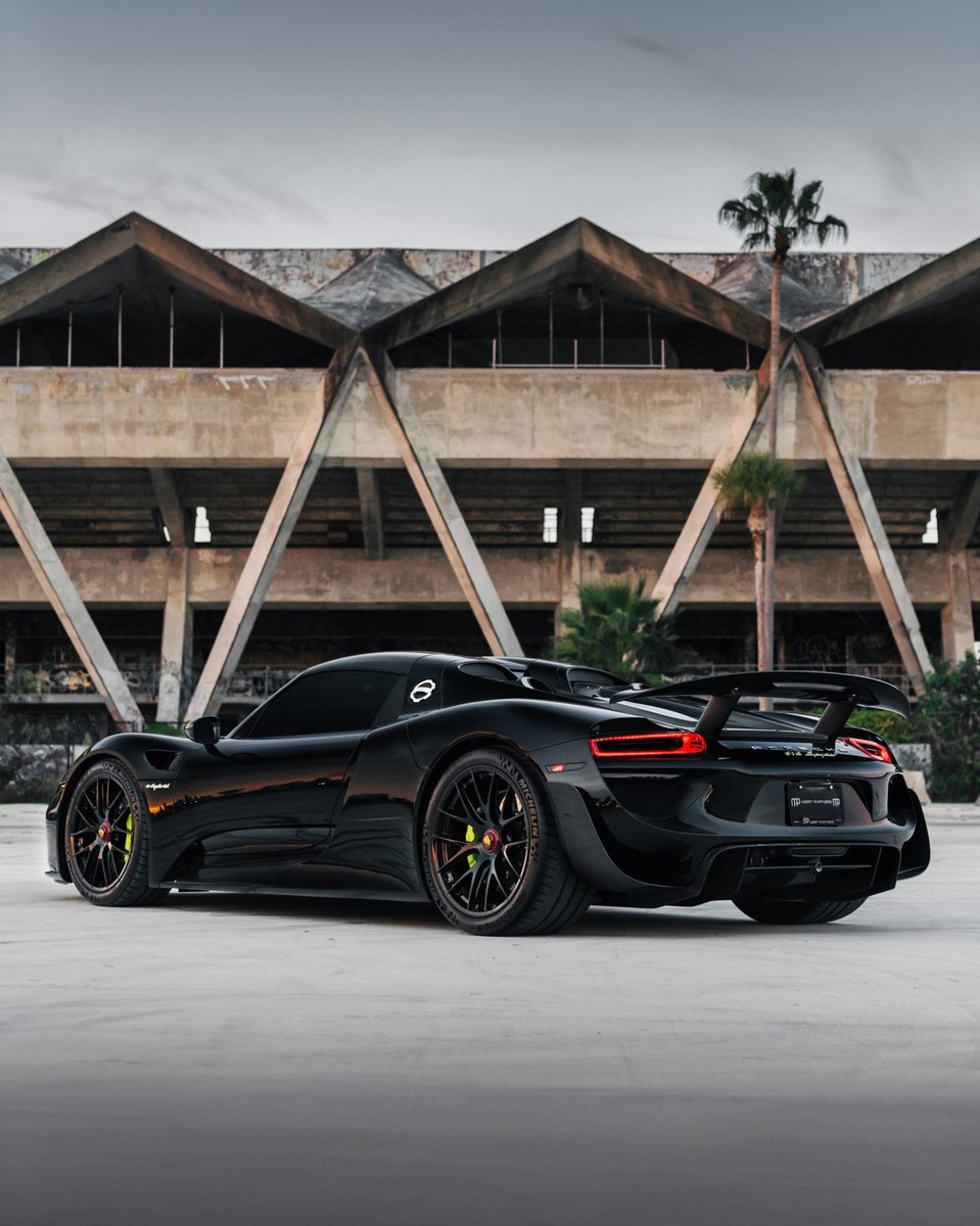 duPontREGISTRY's tweet photo. 2015 Porsche 918 Spyder | 1 of just 13 standard black Weissach cars sold new to the US

This incredible example is finished in Black over a Black leather interior with Acid Green piping. The entire car is wrapped in PPF protecting the paint from rock chips or any road debris https://t.co/oZWF8DrQq7