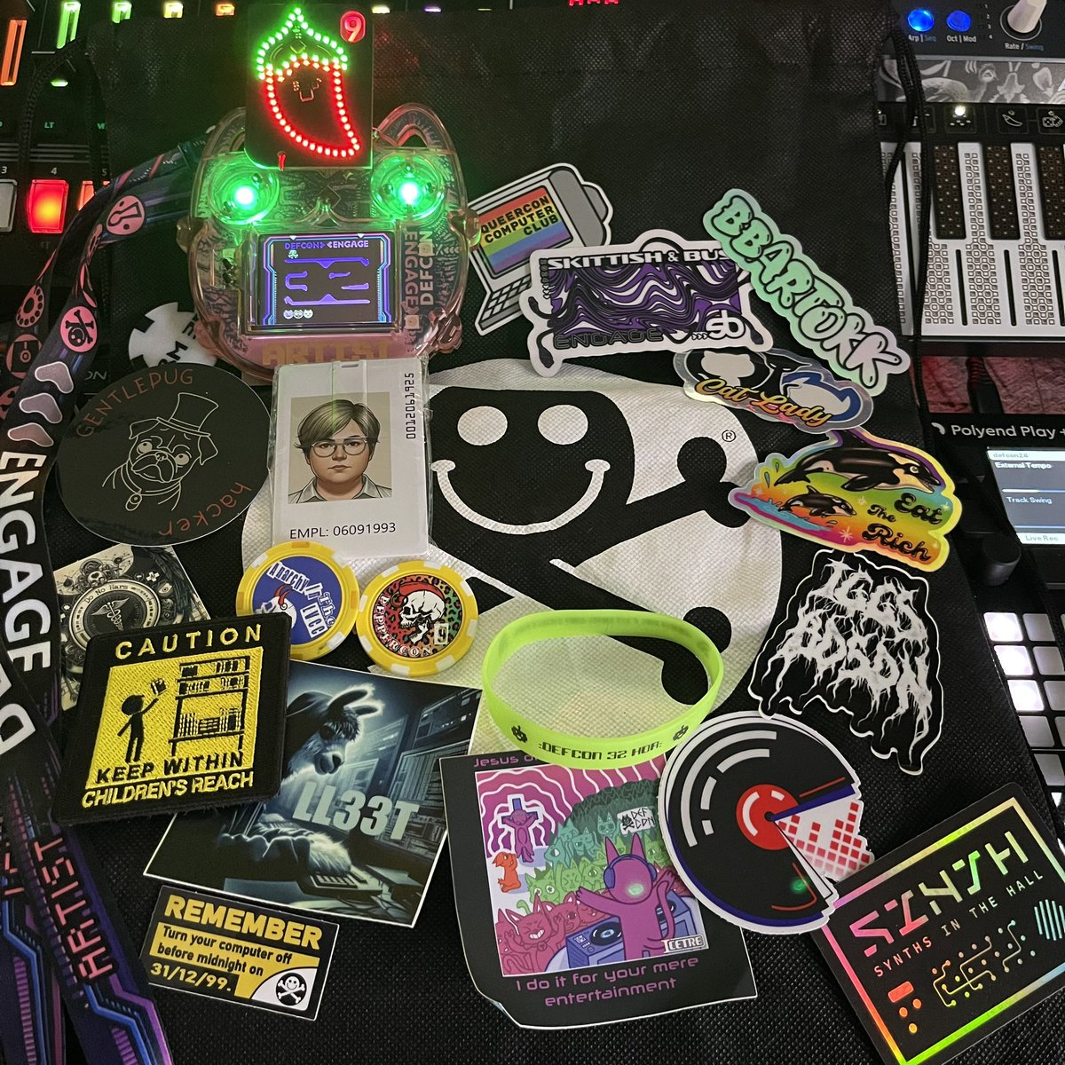 baywolf88's tweet image. The Trinkets and Sticker loot pile from
 #defcon Thanks for all the goodies #hackerfam you’re all creative AF