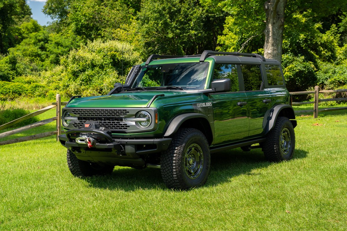 MotorWeek's tweet photo. The 2024 @Ford Bronco Everglades just arrived to MotorWeek HQ for a #QuickSpin!

This beefed up Bronco gets a number of off-road goodies including the Sasquatch package, a WARN winch, and snorkel system. Our tester is equipped with this striking Eruption Green color. Starting price? $55,520.

Stay tuned for more!