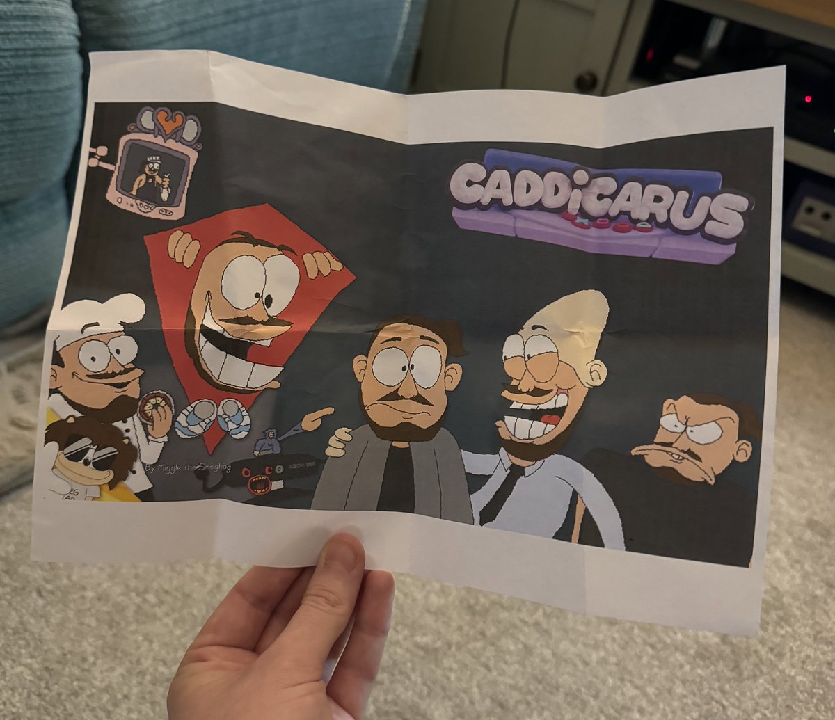 Caddicarus's tweet photo. .@WideDolph3 sent me a printed version of some great pizza-tower-esque art by @MiggleSmeghog , love it https://t.co/dPiC9OvrU9