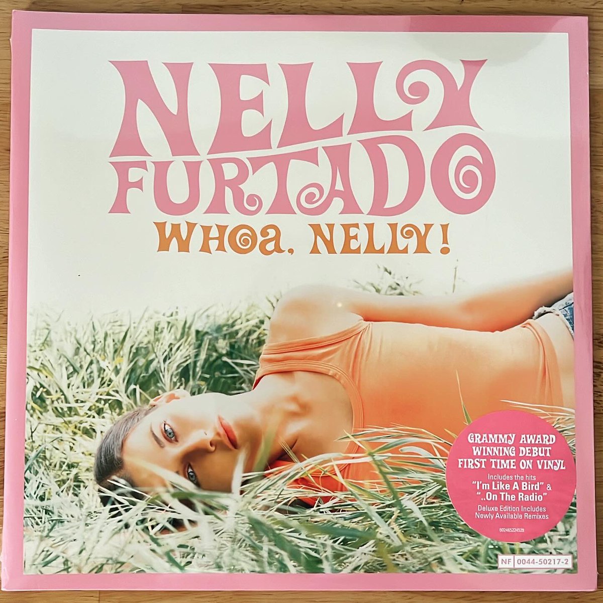 BionicJen77's tweet photo. Adding @NellyFurtado ‘s iconic “Whoa Nelly” album on vinyl for the first time. I got the deluxe edition on pink and orange vinyl! 💗🧡 #nellyfurtado #pinkvinyl #orangevinyl #whoaNelly #vinyl https://t.co/uDW98Lr20w