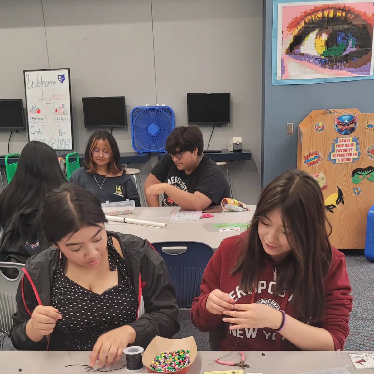LobosLibrary's tweet photo. Just a few of the happy faces who joined us for Game night. We had snacks, made bracelets, and played games.  The Lobo Library will be open now every Tuesday &amp; Thursday till 6pm.  Next Game Night in September.   Come out Thursday to see what we have to offer.. #LobosWillBeHeard https://t.co/8WUD5uUiFg