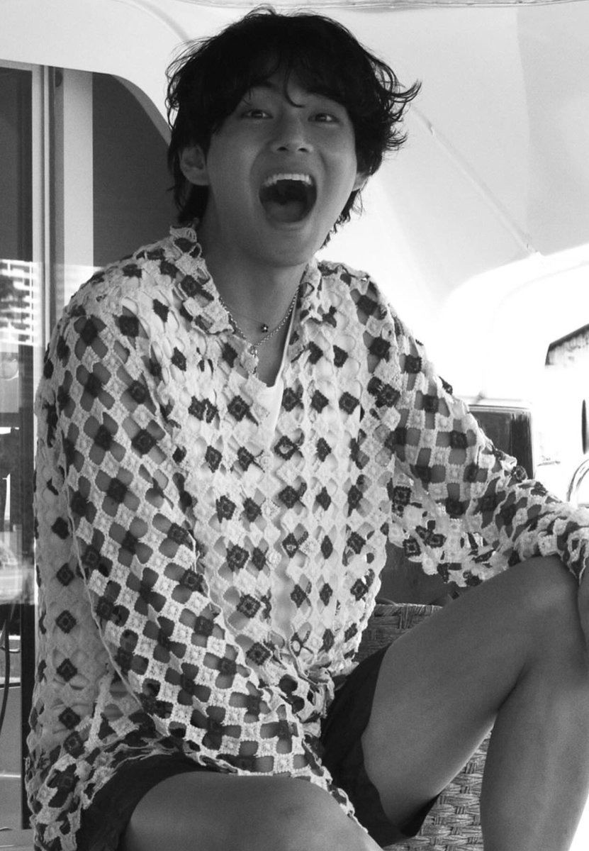 My smile beams just like you see here. I’ve captured this moment through my camera lens, and even though it’s in black and white, the joy is undeniable.