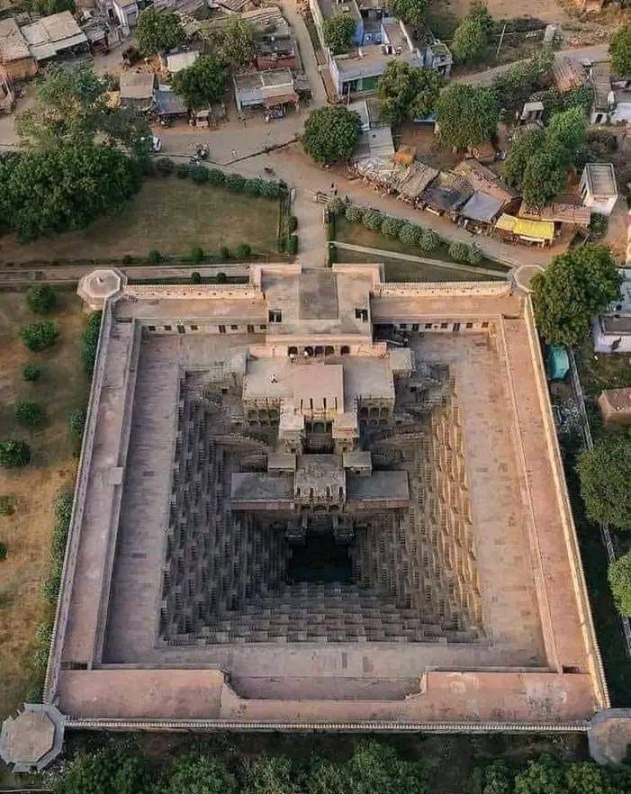 archeohistories's tweet photo. Chand Baori (Stepwell) in Abhaneri Village, Rajasthan, India :

Chand Baori is said to be named after a local ruler of Nikumbh dynasty called Raja Chanda.  However, no epigraphic evidence has been found regarding the construction of the Chand Baori or adjoining Harshat Mata Temple (goddess of joy and happiness for village; dated 9th-10th Century AD). Based on similarities in style and carvings with the terraced temples of Paranagar and  Mandore, Baori can be dated to 8th-9th Century AD. It was likely constructed before the temple.  According to Morna Livingston in Steps to Water: The Ancient Stepwells of India, Chand Baori is one of the few stepwells that has "two classical periods of water building in a single setting".

It was built by King Chanda of the Nikumbha Dynasty in 9th Century AD. One of the largest stepwells in the world, Chand Baori was built to conserve water and provide a respite from the intense heat. It was a community gathering place for locals as well as royals. The oldest parts of the step-well date from 8th Century onwards. An upper palace building was added to site, which is viewed from tabulated arches used by Chauhan rulers. Now, it extends 30m into the ground, making it one of the deepest and largest stepwells in India.

Chand Baori is a deep four-sided well with a large temple located in back of well. Basic architectural aspects of the monumental well consist of a long corridor of steps leading to 5-6 stories below ground level which can be seen at the site. Chand Baori consists of 3500 narrow steps over 13 stories. Rajasthan is extremely arid and design and final structure of Chand Baori were intended to conserve as much water as possible. It's exquisite diamond-setting geometry of the cascading steps on three sides and image of Sheshasayee Vishnu reclining on serpent Ananta. This baori or stepwell has been constructed in an upside-down pyramid-style. 

Classical Indian texts on architecture (Vastu) like  Aparajitapriccha or Vishvakarma's Vastushastra call this design a  Vijay Vapi. Baori has double flights of steps on each of its ten landings on all three sides. On the fourth side, to north, is a pillared corridor of many stories. This wall at north contains two projected offsets to house a niche in each of them. These two niches serve as shrines, right one houses deity Ganesha while left one has an image of Mahishasuramardini. Ganesha shrine is crowned with chaitya having a female dancer and her attendant carved over it. There are many other dancing figures and attendants carved around this structure. On upper section, carvings depicting Uma-Maheshwara and Simhavahini Durga can be seen in small nimodifications, repairs, reconstructions since its construction as it was in continuous use till late medieval period. 

The stepwell underwent many changes for both beautification and better utitlity. A pillared verandah on all four sides seems to be a later addition. There is also a small room, Anderi Ujala, which was a spot to draw water with some traditional pulley-like equipment. Ancient Indian scriptures made references to construction of wells, canals, tanks and dams and their efficient operation and maintenance. This site combined many of these operations to allow for easy access to local water. At the bottom of well, air remains 5-6 °C cooler than at the surface, and Chand Baori was used as a community gathering place for locals during periods of intense heat. One side of well has a haveli pavilion and resting room for the royals.

The stepwell, served multiple purposes alongside drawing water and playing a significant role in religious or ceremonial activities. Pilgrims are said to have found comfort in quenching their thirst and finding a resting spot at the steps of Chand Baori after their long travels.

📷 : Credit to the Owner

#archaeohistories