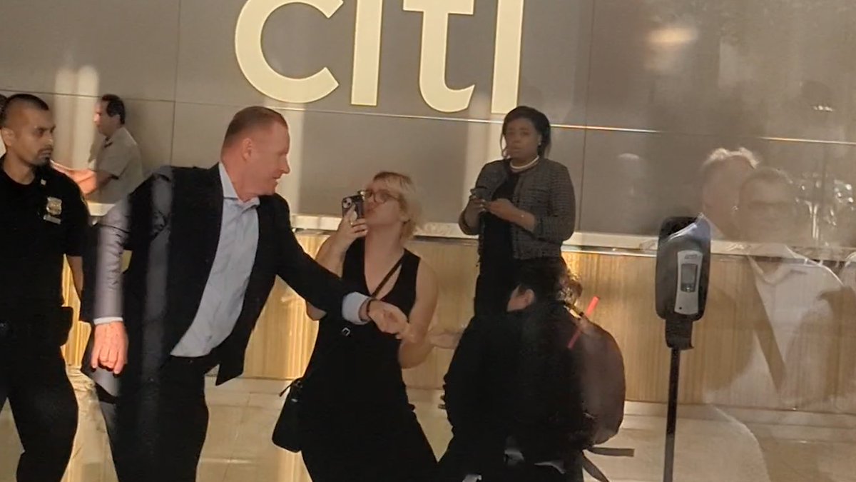 <a href="/Citi/">Citi</a> staff punched a climate activist in the face this morning, because they were taking video of a peaceful direct action. <a href="/NYPD/">NY Publishing Depot</a> (standing between them in second pic) watched. The victim was arrested. The attacker walked free. 

Violent institutions protect profit. Not people.