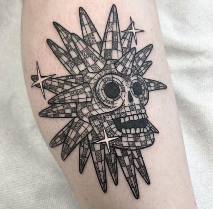 BrowseHorror's tweet image. This Spooky Island disco ball tattoo