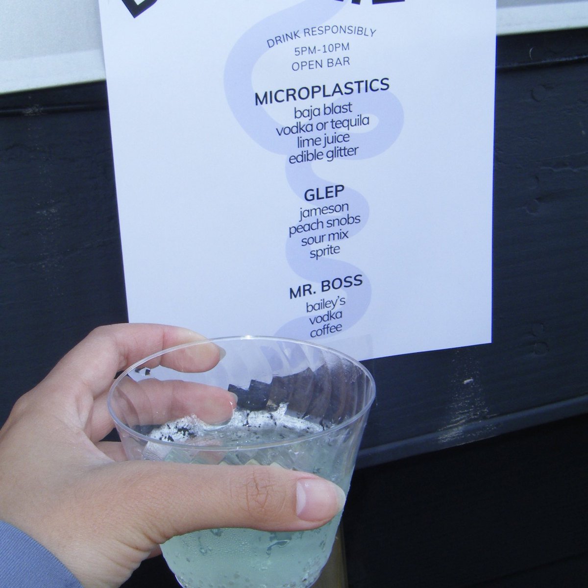 in my time off last month, I bartended for the first time w/friends and mainly made a sparkly baja blast drink called “microplastics”. I cut + dehydrated the limes the night before too! i wish i took a better photo of it lmao but here’s me in front of a cursed selection of drinks