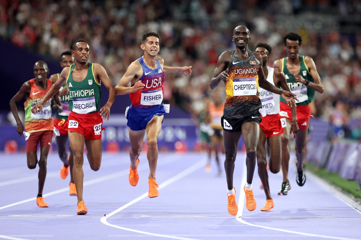 AfricaFactsZone's tweet photo. Ugandan Runner, Joshua Cheptegei has won a Gold medal in the Men's 10,000m race at the 2024 Paris Olympics.

He has set a new Olympic World Record in the 10,000m race with a time of 26 minutes, 43 minutes.

Ethiopian Runner, Berihu Aregawi won an Olympic Silver medal. https://t.co/bASO80iX7O