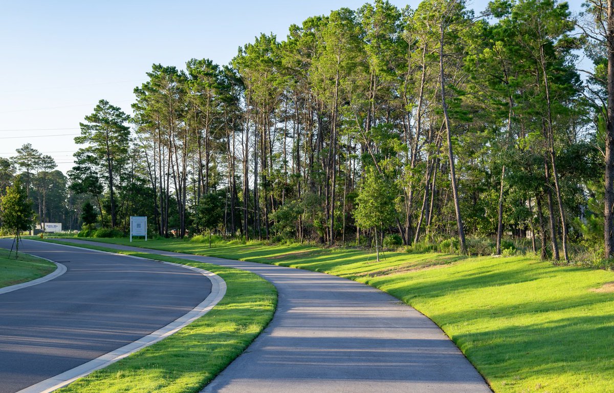 The Watersound Origins community offers access to amenities such as the pool, trails, Origins Golf Course, and other outdoor activities, presenting an active, coastal lifestyle.