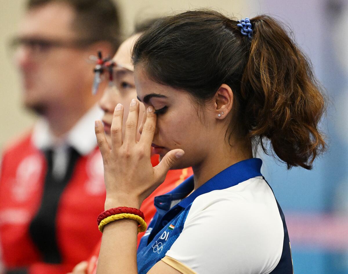 the_hindu's tweet photo. #Paris2024 | #ManuBhaker takes fourth place in the women’s 25m pistol final, coming within one shot of winning a historic third medal in this #Olympics. Bhaker and Veronika Major were tied for the third place and had to face off in a shoot-off. 

📸: Ritu Raj Konwar https://t.co/IEUmzGY3FY