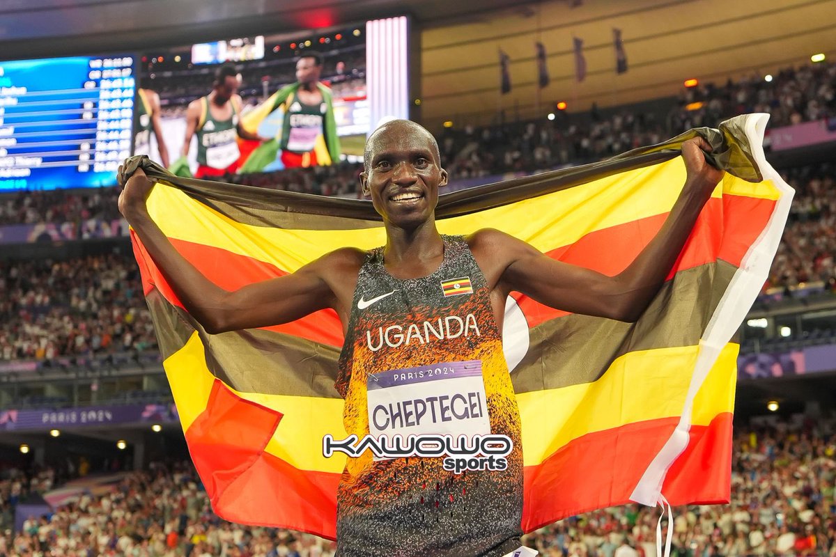 LillyAjarova's tweet photo. Congratulations @joshuacheptege1i on your extraordinary achievement of winning the gold medal and breaking the Olympic record in the 10,000 meters at the #ParisOlympics2024.

Your triumph is a source of immense pride for our nation.

You are a true inspiration to millions and thanks for elevating Uganda's flag on the global stage.

Thank you for making Uganda proud! 
🥇🇺🇬
#Paris2024 

📷 @kawowosports
