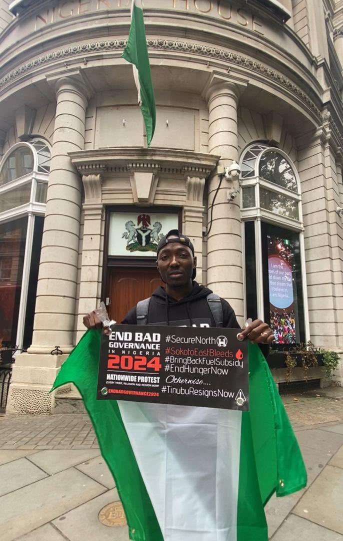 PHOTO STORY: Two Nigerians stage #EndBadGovernance protest in front of the Nigeria's High Commission in London, United Kingdom, on Thursday.