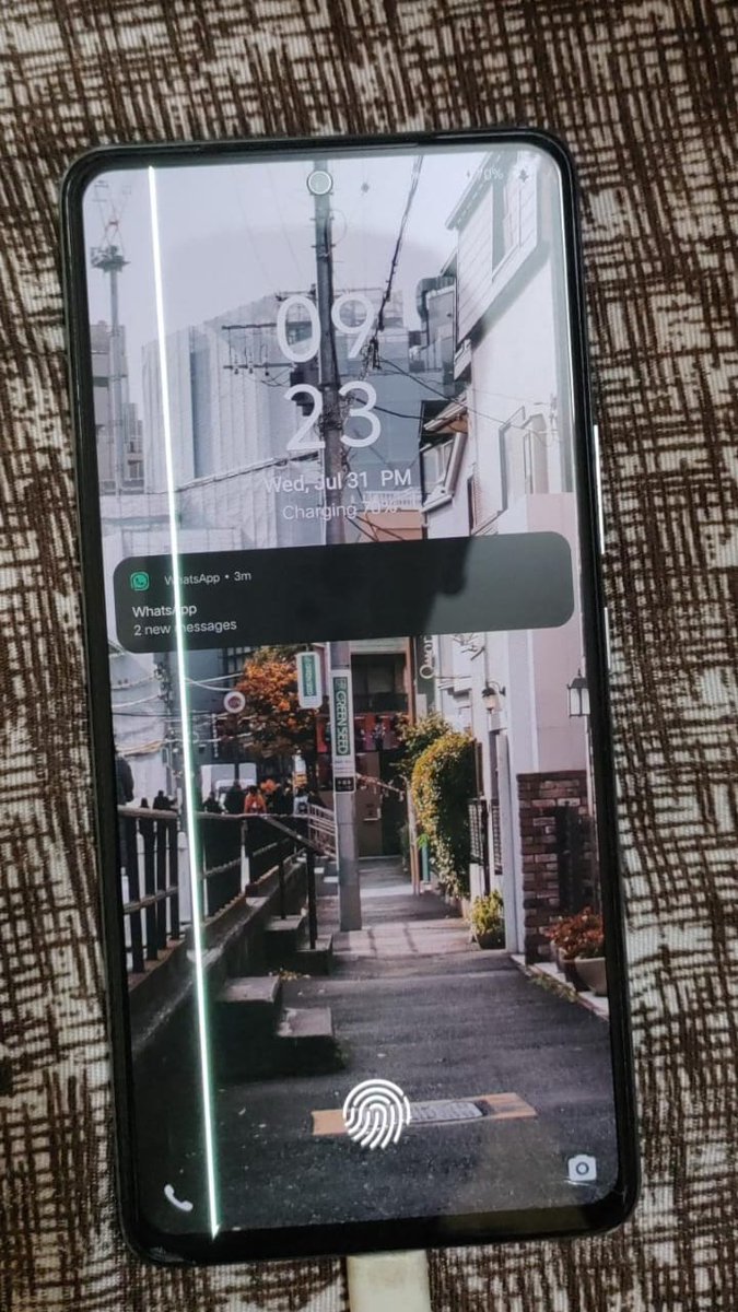 i am experiencing a green line issue on my iQOO 9 SE display. This problem started automatically after restarting the device. Given that this is your flagship phone, I expected better quality. Can you please provide a solution or assistance with this issue?