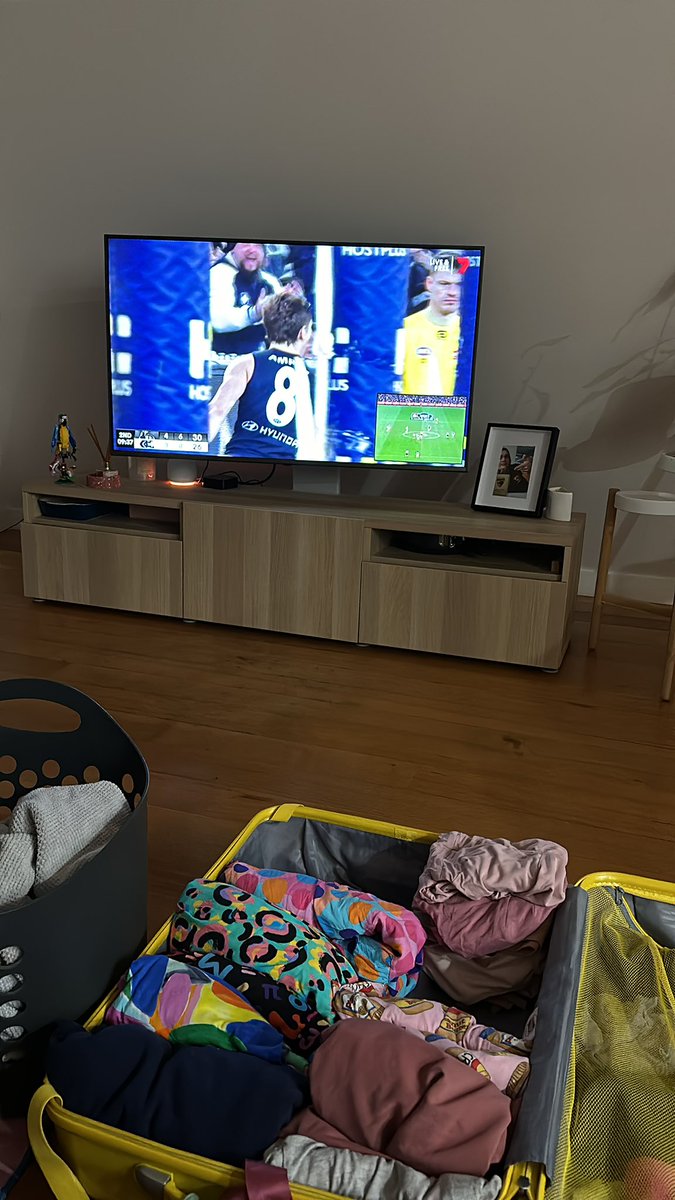 Folding, packing, cleaning, and footy!
