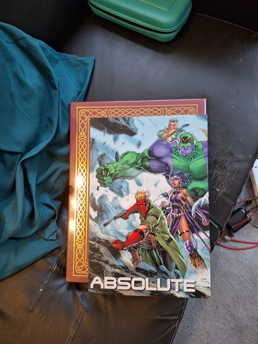 ADR2099's tweet photo. Finally arrived and looking incredible!
Slaine the Horned God anniversary edition  by @PatMillsComics and Simon Bisley from @2000AD

Bigger than what I was expecting- see photo compared to a DC absolute edition 🤯
#slainethehornedgod
#2000adcomics https://t.co/ujw5e1qkiV