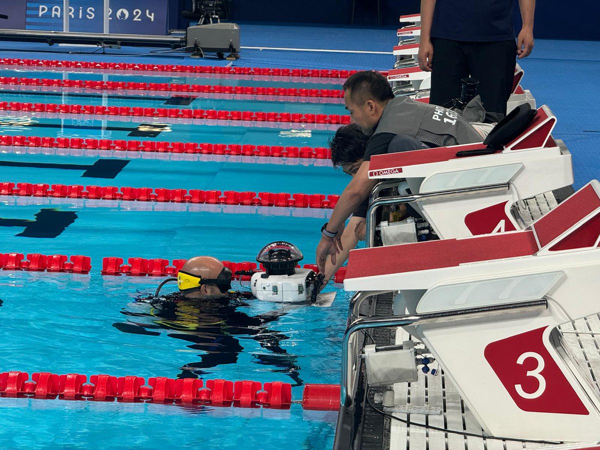 NAUIWorldwide's tweet photo. 'Behind the Scenes' content from NAUI at the Paris 2024 Olympics! 🎥 🎞️
Jeremy Gabrielson, NAUI Special Projects and Event Coordinator, receives an underwater camera from members of a Japanese international news agency.
#DiveNAUI #NAUIWorldwide #Paris2024Olympics #BTS https://t.co/IKSYqm6dCc