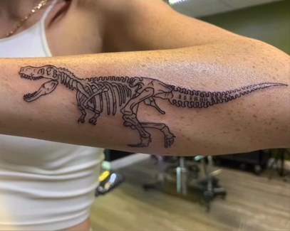 🦖 Unleash the Prehistoric Power with a T-Rex Skeleton Tattoo